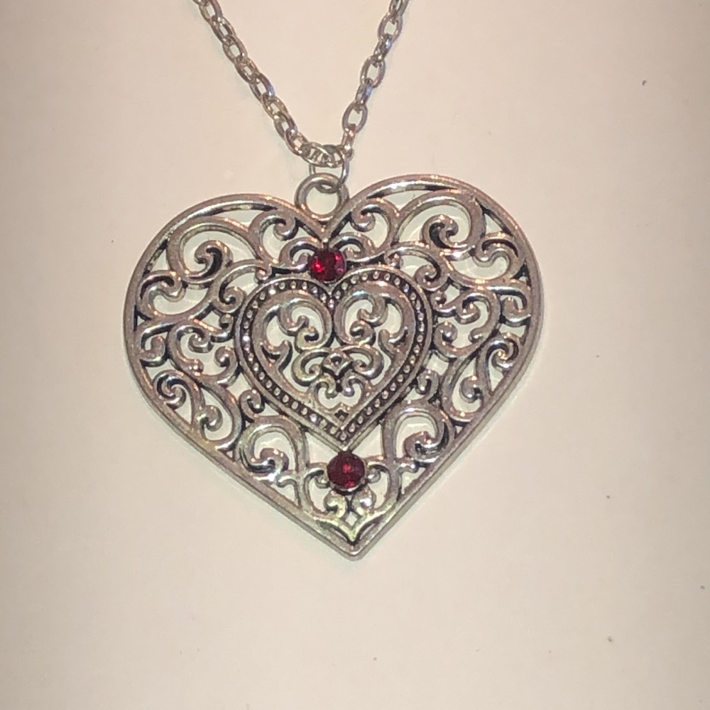 Silver Tone Heart Filigree Necklace with Red Crystal Accent